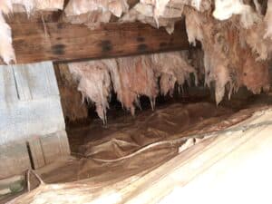 falling insulation in crawl space