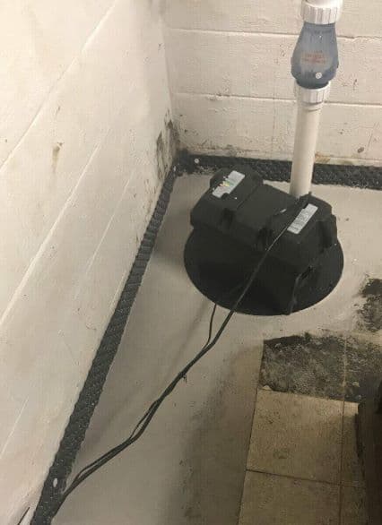 sump pump installed in basement