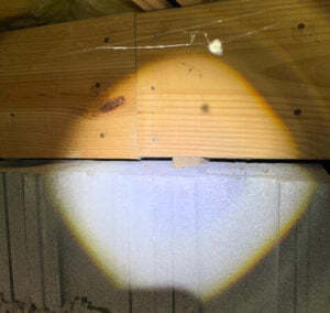 wooden shim has compressed, lowering joist