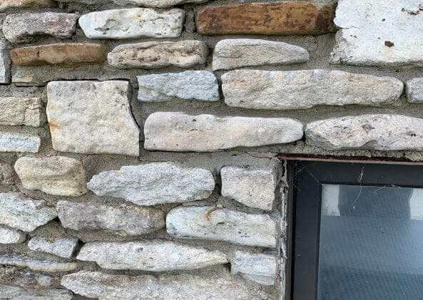 stone foundation with hairline cracks
