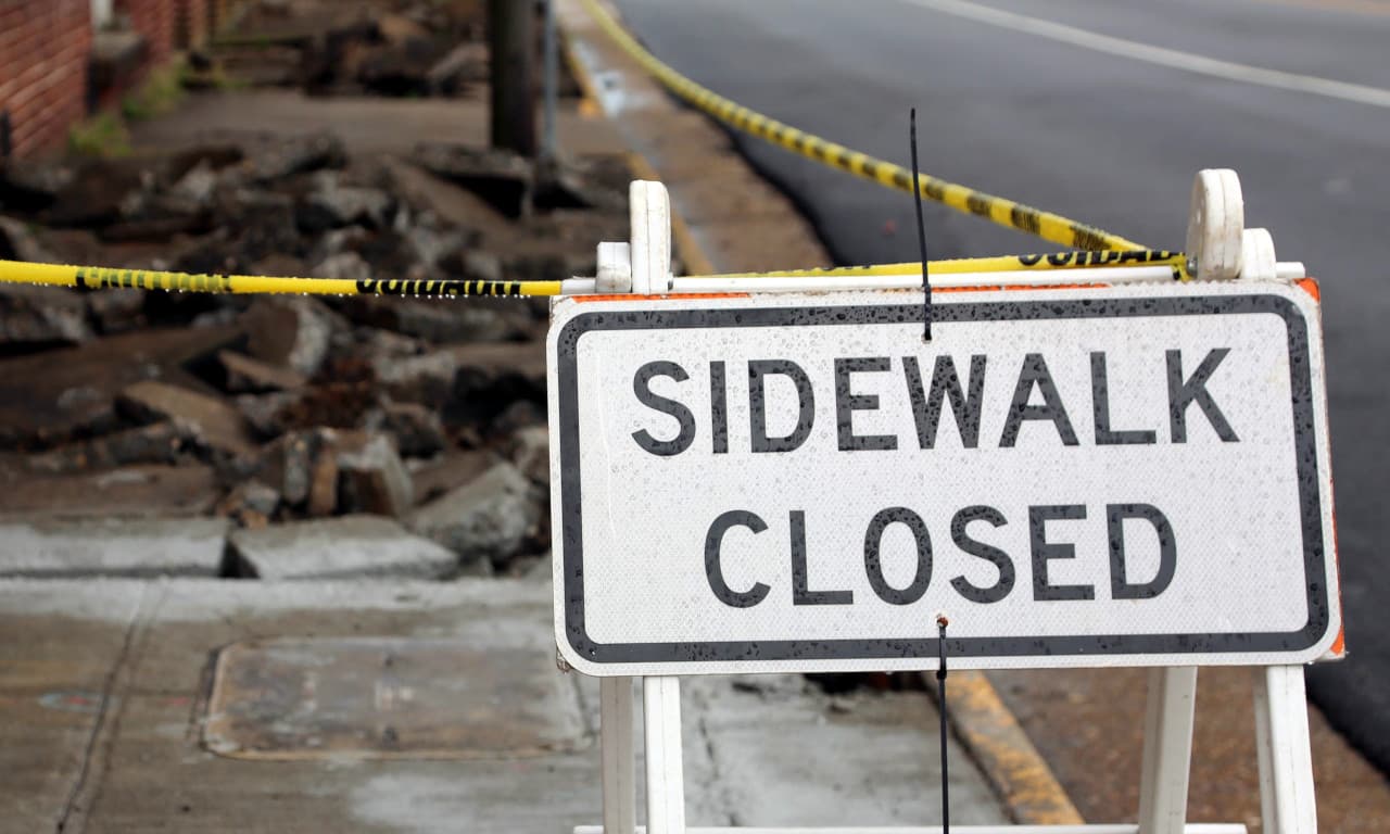 sidewalk closed sign