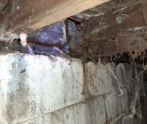 sill plate, floor joists, and band board are damaged